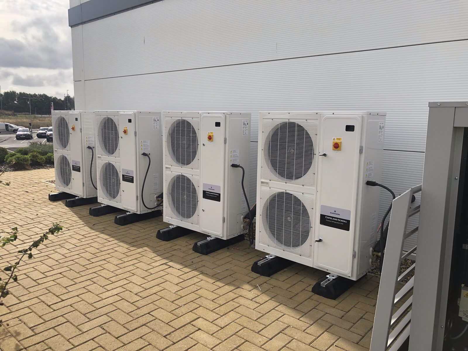 Commercial AC Units - Multiple air conditioning units installed outside commercial premises